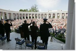 President George W. Bush, Secretary of Defense Donald Rumsfeld and Chairman of the Joint Chiefs of Staff General Richard Meyers participate in a Memorial Day ceremony at the Arlington National Cemetery amphitheatre in Arlington, Va., May 30, 2005.  White House photo by Paul Morse