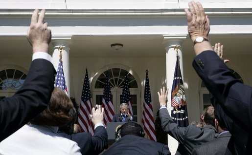 President George W. Bush points to raised hands as he fields a question from the media during a press availability Tuesday, May 31, 2005, in the Rose Garden of the White House. White House photo by Eric Draper