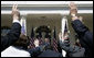 President George W. Bush points to raised hands as he fields a question from the media during a press availability Tuesday, May 31, 2005, in the Rose Garden of the White House. White House photo by Eric Draper