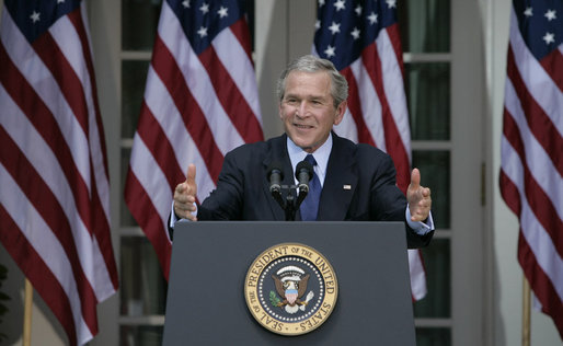 President George W. Bush smiles as he responds to a reporter's question Tuesday morning, May 31, 2005, during a press availability in the Rose Garden of the White House. White House photo by Eric Draper