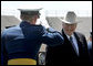 Vice President Dick Cheney is saluted before shaking hands with one the 906 newly-commissioned officers of the U.S. Air Force during a graduation ceremony at the Air Force Academy in Colorado on Wednesday, June 1, 2005. White House photo by David Bohrer