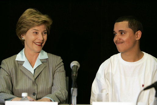 Laura Bush talks with Freddy Martinez, 17, during a roundtable discussion on stopping violent crime in Chicago on June 2, 2005. CeaseFire Chicago is a public health initiative that works with community partners to reduce violence. White House photo by Krisanne Johnson