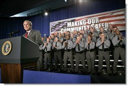 President George W. Bush receives a standing ovation from members of the Ohio State Highway Patrol before delivering remarks on the Patriot Act at in Columbus, Ohio, Thursday, June 9, 2005.  White House photo by Eric Draper