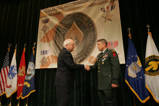 Vice President Dick Cheney awards U.S. Army Chief Warrant Officer Four David Smith the Distinguished Flying Cross during the Heroism Awards Ceremony at the Davis Conference Center, MacDill Air Force Base, in Tampa, Fla., Friday, June 10, 2005. White House photo by David Bohrer