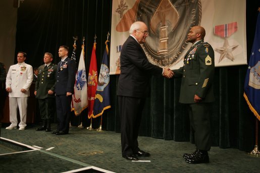 Vice President Dick Cheney awards U.S. Army Sgt. 1st Class Stephan Johns the Silver Star during the Heroism Awards Ceremony at the Davis Conference Center, MacDill Air Force Base, in Tampa, Fla., Friday, June 10, 2005. White House photo by David Bohrer