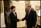 President George W. Bush welcomes Chol-hwan Kang to the Oval Office Monday, June 13, 2005. Mr. Kang is the author of, “The Aquariums of Pyongyang: Ten Years in the North Korean Gulag.” Mr. Kang defected from North Korea and now lives in South Korea and works as a journalist. White House photo by Eric Draper