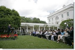 President George W. Bush addresses 200 exchange students from the program in the Rose Garden Monday, June 13, 2005. Living with host families for one year, the students come from mostly Muslim countries. "I think your generation is going to help shape one of the most exciting periods of history in the broader Middle East and the world," said the President. "It's a period of time when the hope of liberty is spreading to millions." White House photo by Eric Draper