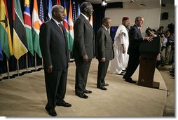 Standing with the Presidents of Botswana, Ghana, Namibia, Mozambique and Niger, President Bush discussed the African Growth and Opportunity Act, AGOA, in the Dwight D. Eisenhower Executive Office Building Monday, June 13, 2005. "All of us share a fundamental commitment to advancing democracy and opportunity on the continent of Africa," said the President. "And all of us believe that one of the most effective ways to advance democracy and deliver hope to the people of Africa is through mutually beneficial trade."  White House photo by Eric Draper