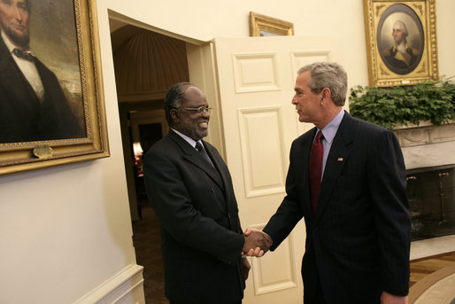 Meeting with the leaders from Mozambique, Botswana, Niger, Ghana and Namibia, President George W. Bush welcomes President Hifikepunye Pohamba of Namibia to the Oval Office Monday, June 13, 2005. The leaders discussed a range of topics, including AGOA. "All the Presidents gathered here represent countries that have held democratic elections in the last year," said President Bush. "What a strong statement that these leaders have made about democracy and the importance of democracy on the continent of Africa." White House photo by Eric Draper