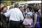 President George W. Bush meets with guests during the Congressional Picnic on the South Lawn Wednesday, June 15, 2005. White House photo by Paul Morse