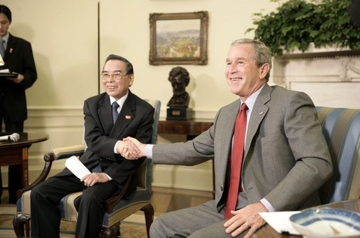 President George W. Bush and Prime Minister Phan Van Khai of Vietnam deliver statements to the media in the Oval Office Tuesday, June 21, 2005. "We discussed our economic relations. And I noted that the Vietnamese economy is growing quite substantially. We talked about our desire for Vietnam to join the WTO," said the President. "We talked about security issues and a mutual desire to coordinate in the war on terror." White House photo by Eric Draper