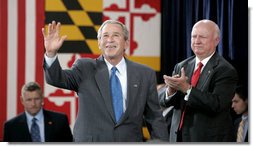 Sam Bodman, Secretary of Energy, leads the applause as President George W. Bush acknowledges the audience after speaking to 400 guests and employees at the Calvert Cliffs Nuclear Power Plant Wednesday, June 22, 2005, in Lusby, Md.  White House photo by Paul Morse