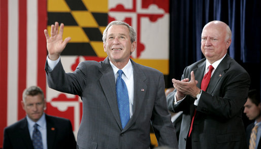Sam Bodman, Secretary of Energy, leads the applause as President George W. Bush acknowledges the audience after speaking to 400 guests and employees at the Calvert Cliffs Nuclear Power Plant Wednesday, June 22, 2005, in Lusby, Md. White House photo by Paul Morse