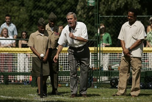 President Bush yells "Play Ball!" as he places the ball on a tee Sunday, June 26, 2005, during "Tee Ball on the South Lawn." White House photo by Krisanne Johnson