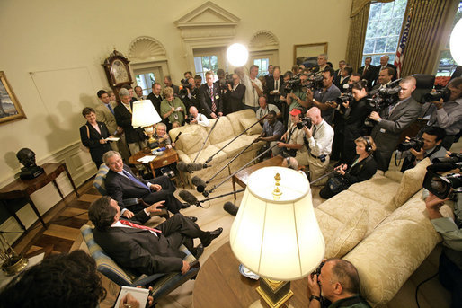 President George W. Bush and German Chancellor Gerhard Schroeder talk with the media in the Oval Office Monday, June 27, 2005. "It's my honor to welcome the Chancellor of an ally and a friend back to the Oval Office. We have had and will continue to have a frank and open discussion about very important issues. Germany is a very important country in Europe, and Germany is a friend of the United States," said the President in his opening statement. White House photo by Eric Draper