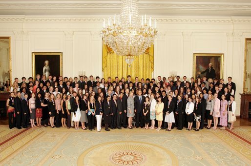President George W. Bush and Secretary of Education Margaret Spellings stand with the 2005 Presidential Scholars in the East Room June 27, 2005. Chosen from more than 2,700 high school candidates, 141 scholars are honored for their accomplishments in academics and the arts. White House photo by Krisanne Johnson
