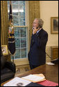 President George W. Bush speaks via phone to Associate Supreme Court Justice Sandra Day O'Connor Friday, July 1, 2005, shortly after she submitted her letter of resignation citing personal reasons. The letter sits on the desk. White House photo by Paul Morse