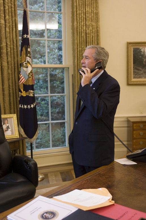President George W. Bush speaks via phone to Associate Supreme Court Justice Sandra Day O'Connor Friday, July 1, 2005, shortly after she submitted her letter of resignation citing personal reasons. The letter sits on the desk. White House photo by Paul Morse
