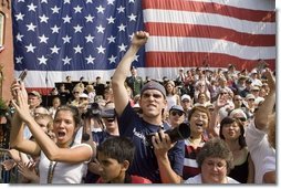 An estimated 3,000 celebrated Independence Day Monday, July 4, 2005, by cheering on President George W. Bush as he spoke at West Virginia University in Morgantown.  White House photo by Krisanne Johnson