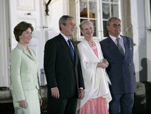 President George W. Bush and Mrs Bush join Her Majesty Queen Margrethe II and His Royal Highness The Prince Henrik of Denmark after arriving at the Fredensborg Palace, Tuesday, July 5, 2005. White House photo by Eric Draper