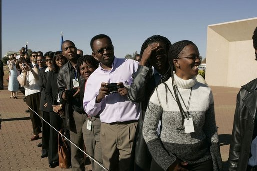 People wait in line to see the departure of Laura Bush Monday, July 11, 2005 at Gaborone International Airport in Gaborone, Botswana. White House photo by Krisanne Johnson