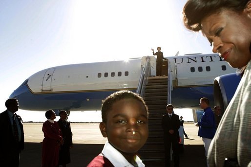 A child is seen on the tarmac at the departure of Laura Bush Monday, July 11, 2005 at Gaborone International Airport in Gaborone, Botswana. White House photo by Krisanne Johnson
