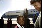 A child is seen on the tarmac at the departure of Laura Bush Monday, July 11, 2005 at Gaborone International Airport in Gaborone, Botswana. White House photo by Krisanne Johnson