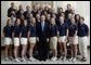 President George W. Bush stands with members of the University of Michigan Women's Softball team Tuesday, July 12, 2005, during Championship Day at the White House. White House photo by David Bohrer