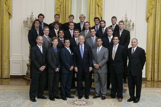 President George W. Bush stands with members of the UCLA Men's Water Polo Team Tuesday, July 12, 2005, during Championship Day at the White House. White House photo by David Bohrer