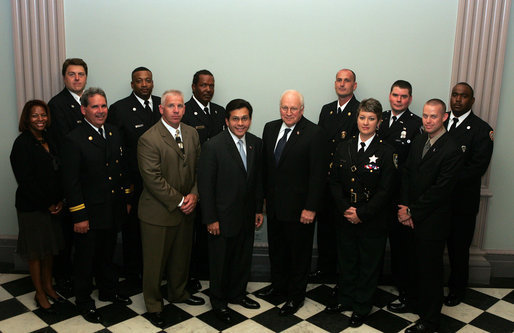 Vice President Dick Cheney and Attorney General Alberto Gonzales stands with recipients of the 2005 Public Safety Officer Medal of Valor Award in the Dwight D. Eisenhower Executive Office Building Thursday, July 14, 2005. The Medal of Valor is awarded to public safety officers cited by the Attorney General for extraordinary courage above and beyond the call of duty. White House photo by David Bohrer