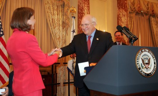 Vice President Dick Cheney congratulates Toria Nuland after her swearing-in as the Ambassador of the United States of America to the North Atlantic Treaty Organization Wednesday, July 13, 2005, at the U.S. State Department. Also pictured is Undersecretary of State Nicholas Burns. White House photo by David Bohrer