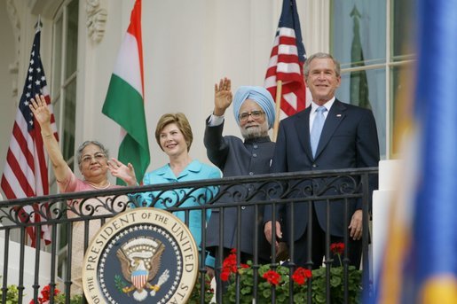 President Bush stands with India's Prime Minister Dr. Manmohan Singh, Laura Bush and Singh's wife, Mrs. Gursharan Kaur, Monday, July 18, 2005 during the Prime Minister's official visit to the White House. White House photo by Krisanne Johnson