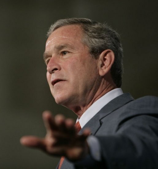 President George W. Bush gestures as he addresses the Hispanic Alliance for Free Trade, Thursday, July 21, 2005, at the Organization of American States in Washington. President Bush thanked the group for their support of CAFTA. White House photo by Eric Draper
