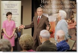 President George W. Bush appears with his mother Barbara Bush, and Medicare trainer Patty Patterson, Friday, July 22, 2005, at the Wesley Woods Center in Atlanta, to talk about new options in Medicare available to senior citizens.  White House photo by Paul Morse