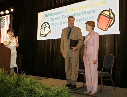 Laura Bush and her brother-in-law Florida Gov. Jeb Bush are applauded upon their arrival at the Teen Trendsetters Reading Mentors 2005 Annual Summit, July 26, 2005 at the Wyndham Orlando Resort in Orlando, Florida. White House photo by Krisanne Johnson