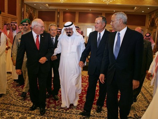 Vice President Dick Cheney walks with newly crowned King Abdullah, former President George H. W. Bush, and former Secretary of State Colin Powell during a retreat at King Abdullah's Farm in Riyadh, Saudi Arabia Friday, August 5, 2005, following the death of Abdullah's half-brother King Fahd who passed away August 1, 2005. White House photo by David Bohrer