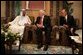 Vice President Dick Cheney and former President George H.W. Bush talk with newly crowned King Abdullah of Saudi Arabia, following the recent death of King Fahd, Friday, August 05, 2005. The vice president led a delegation to pay respects and offer condolences. White House photo by David Bohrer