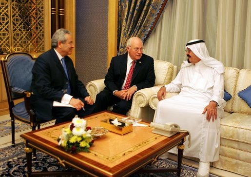 Vice President Dick Cheney speaks with newly crowned King Abdullah during a retreat at King Abdullah's Farm in Riyadh, Saudi Arabia Friday, August 5, 2005, following the death of his half-brother King Fahd who passed away August 1, 2005. Interpreter Gamal Helal, center, is also pictured. White House photo by David Bohrer