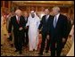 Vice President Dick Cheney walks with newly crowned King Abdullah, former President George H.W. Bush, and former Secretary of State Colin Powell during a retreat at King Abdullah's Farm in Riyadh, Saudi Arabia Friday, August 5, 2005, following the death of Abdullah's half-brother King Fahd who passed away August 1, 2005. White House photo by David Bohrer