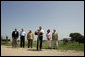 President George W. Bush addresses the media at his Crawford, Texas ranch flanked by members of Defense Policy and Programs Team, Secretary of State, and Foreign Policy Team Thursday, August 11, 2005. White House photo by David Bohrer