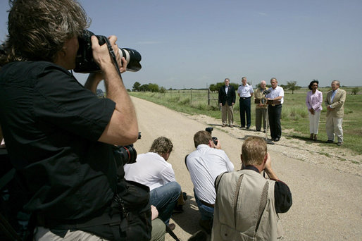 President George W. Bush talks with the media Thursday, Aug. 11, 2005, at the Bush Ranch in Crawford, Texas, after meeting with the Defense and Foreign Policy teams. White House photo by Eric Draper