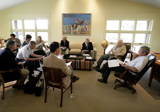 President George W. Bush and Vice President Dick Cheney listen Thursday, Aug. 11, 2005, to Secretary of Defense Donald Rumsfeld during a meeting with the Defense Policy and Program teams at the Bush Ranch in Crawford, Texas. White House photo by Eric Draper