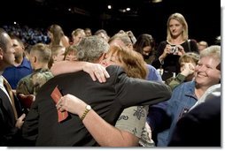 The mother of four sons currently deployed to Iraq, Tammy Pruett, is embraced by President George W. Bush following his speech at Idaho Center Arena, Wednesday, Aug. 24, 2005 in Nampa, Idaho, honoring the service of National Guard and Reserve troops serving in Afghanistan and Iraq.  White House photo by Paul Morse