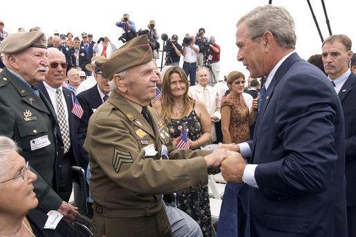 President George W. Bush greets a veteran after delivering remarks to commemorate the 60th anniversary of V-J Day at the Naval Air Station in San Diego, Calif., August 30, 2005. White House photo by Paul Morse