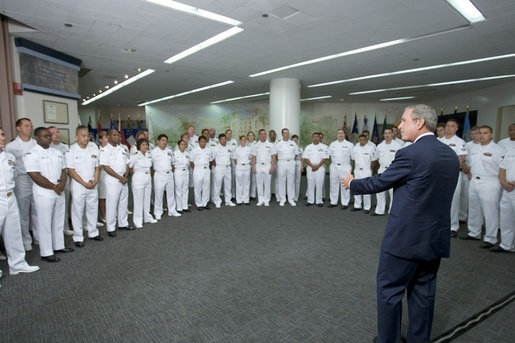 President George W. Bush talks with health care providers at the Naval Medical Center during a visit to commemorate the 60th anniversary of V-J Day at the Naval Air Station in San Diego, Calif., August 30, 2005. White House photo by Paul Morse
