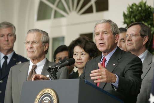 President George W. Bush stands with Secretary of Defense Donald Rumsfeld; Secretary of Labor Elaine Chao and Mike Leavitt, Secretary of Health and Human Services, as he speaks to the media from the Rose Garden of the White House regarding the devastation along the Gulf Coast caused by Hurricane Katrina. White House photo by Paul Morse