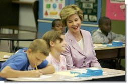 Laura Bush observes a fifth grade math class at Lovejoy Elementary School in Des Moines, Iowa, Thursday, September 8, 2005.  White House photo by Krisanne Johnson
