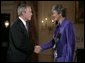 President George W. Bush congratulates Karen Hughes after her swearing-in by U.S. Secretary of State Condoleezza Rice, Friday, Sept. 9, 2005 at the State Department in Washington, to be the Under Secretary of State for Public Diplomacy. White House photo by Eric Draper