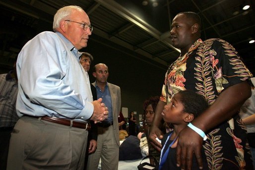 Vice President Dick Cheney visits with families who have been relocated from their homes in Louisiana and Mississippi to the Austin Convention Center in Austin, Texas Saturday, September 10, 2005. The Convention Center has been designated as one of the many temporary shelters for Katrina Hurricane evacuees. White House photo by David Bohrer