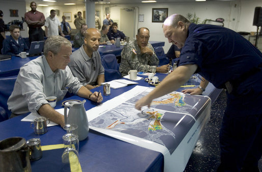 President George W. Bush, joined by New Orleans Mayor C. Ray Nagin, is given a briefing by U.S. Army Lt. General Russel L. Honore and U.S. Coast Guard Vice Admiral Thad W. Allen, Monday, Sept. 12, 2005 at the operations center in New Orleans, La. White House photo by Paul Morse